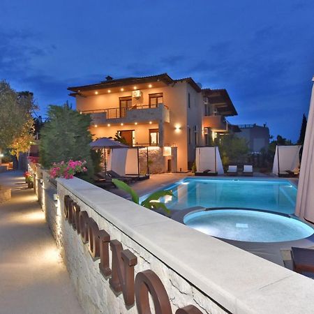 Sinodinos Deluxe Apartments อาฟิโตส ภายนอก รูปภาพ