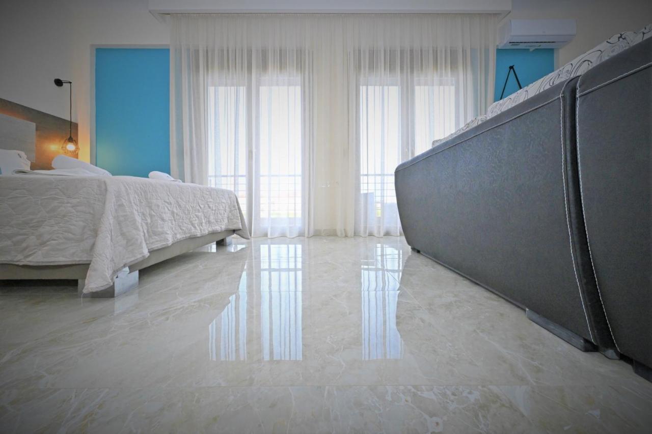 Sinodinos Deluxe Apartments อาฟิโตส ภายนอก รูปภาพ