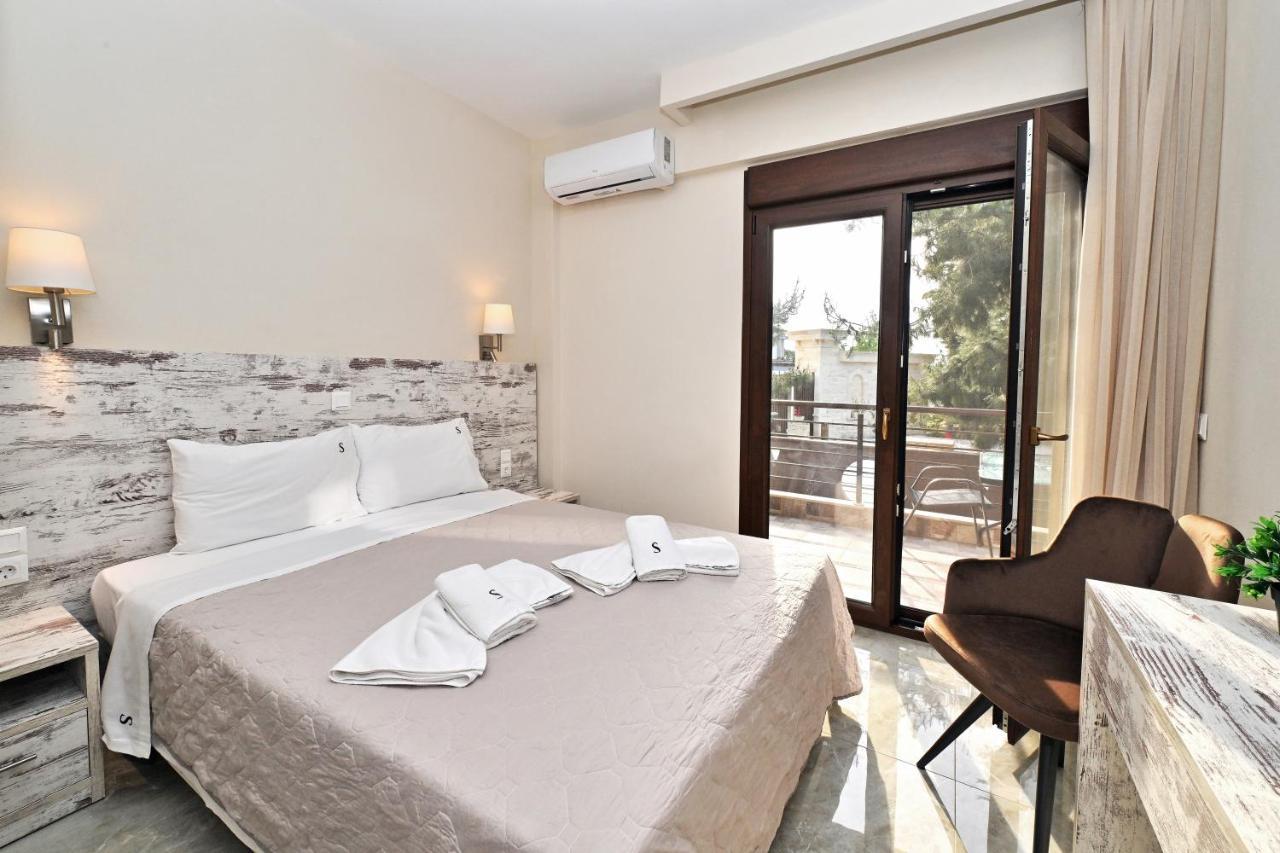 Sinodinos Deluxe Apartments อาฟิโตส ภายนอก รูปภาพ