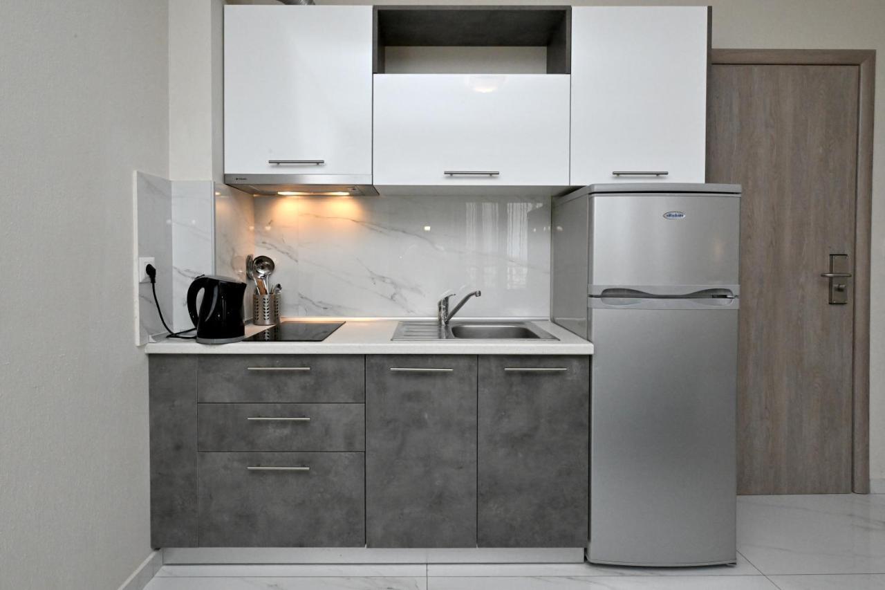 Sinodinos Deluxe Apartments อาฟิโตส ภายนอก รูปภาพ