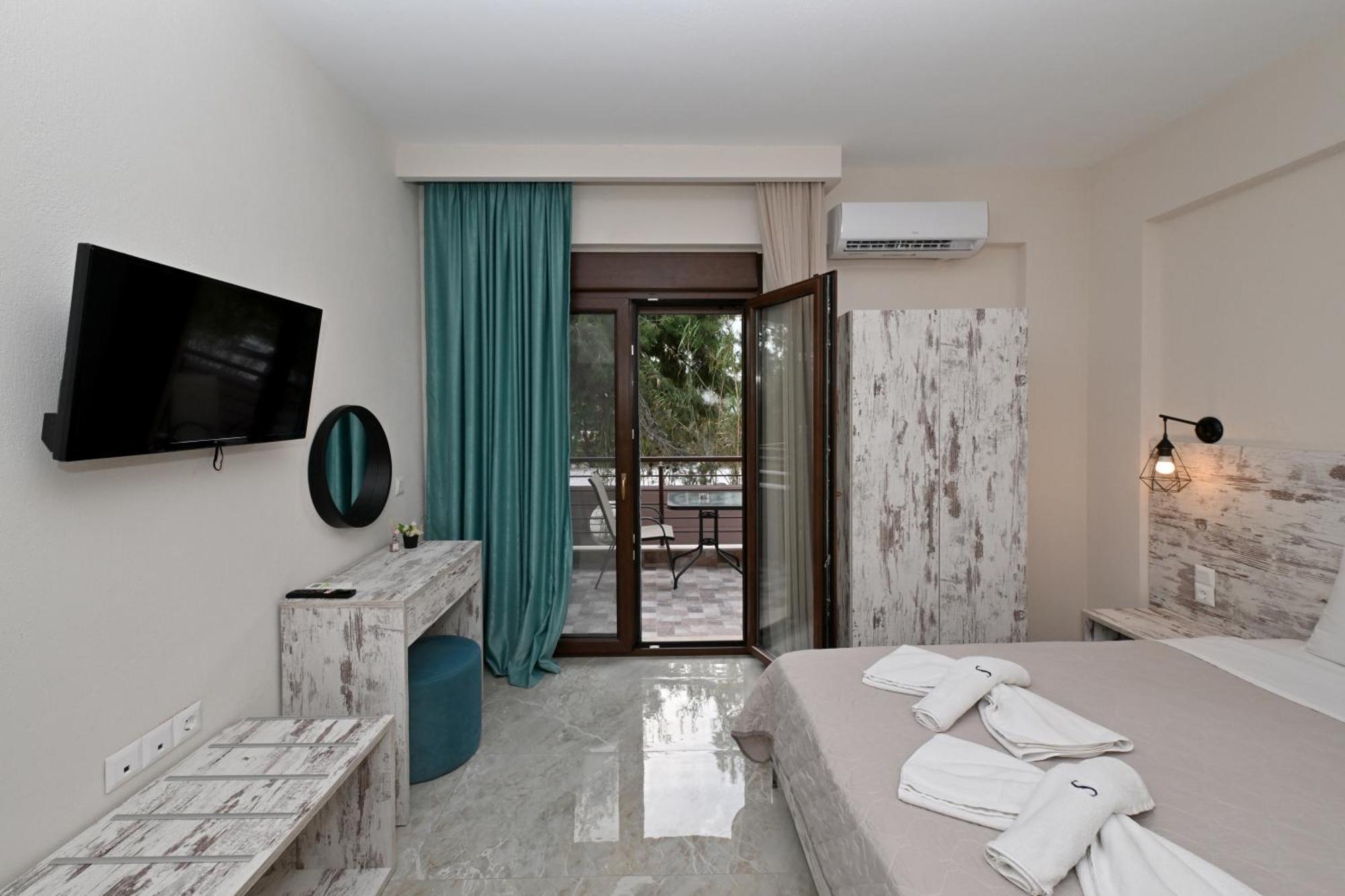 Sinodinos Deluxe Apartments อาฟิโตส ภายนอก รูปภาพ