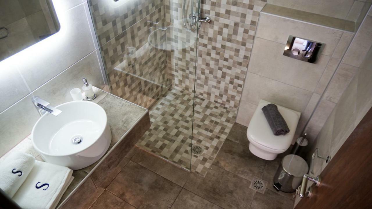 Sinodinos Deluxe Apartments อาฟิโตส ภายนอก รูปภาพ